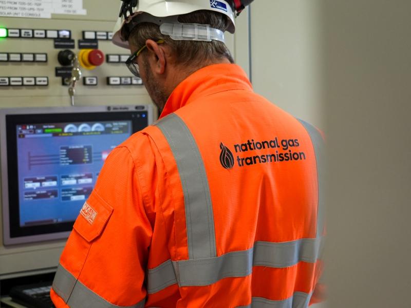 National Gas worker operating control equipment.